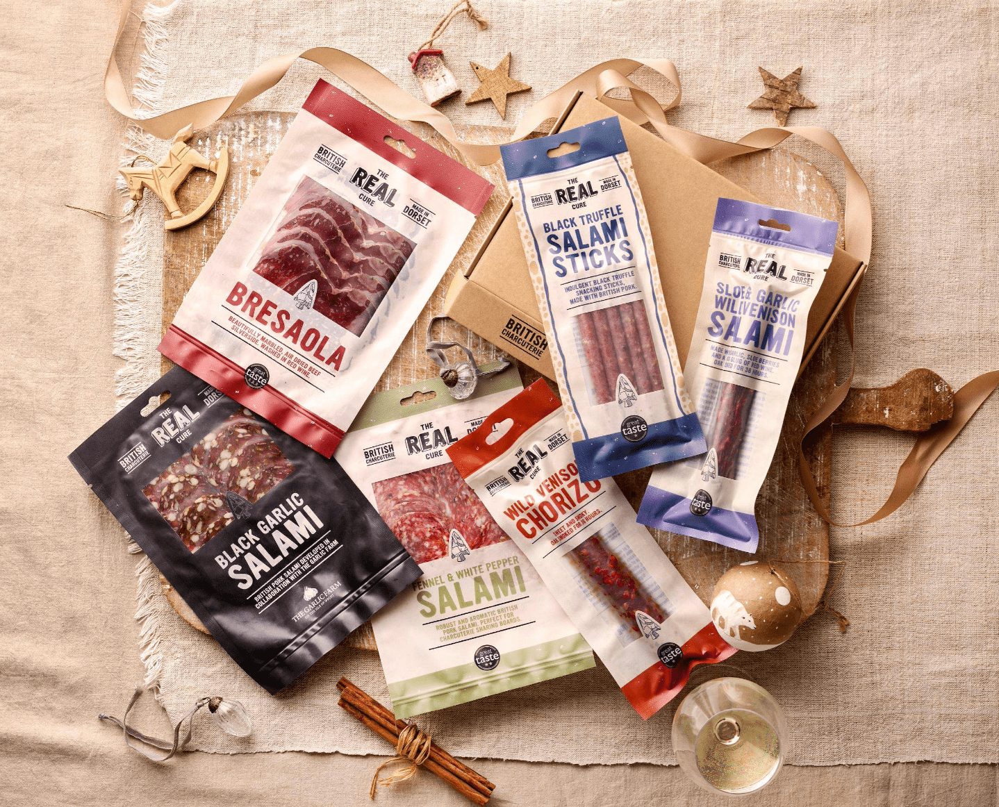 Festive Letterbox charcuterie arranged on a beige background